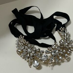 Headpiece for special occasions with a black velvet ribbon